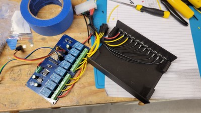 This was the initial poke at the relayinator. The bottom row of barrel connectors are wired to a few ATX extension connectors. This would need to be revisited later to just hardwire power all the time.