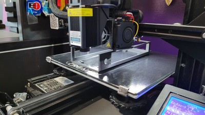 LOOK AT THAT BRIDGE! This is a prototype of the switch mount, printed without support because I didn't plan to let it finish. This test print was to confirm height/width and power wire placement only.