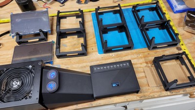 More parts in hand and more models done, so it's time for another test fit. This time the LCD touch screens and the power wire cover (with awesome voltmeters) are added to the mix. Notice the status messages scrolling on the relayinator at bottom center. Looking good!