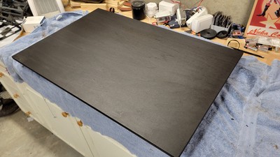 Enough test fitting - time to cut a real board and start getting it ready. This is cabinet grade plywood that was hanging out in inventory. This picture was taken just after the board was stained with True Black from Minwax but before tossing on two layers of poly for protection. Looks AWESOME!