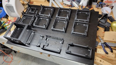 Finally - all of the holsters are printed and fitted. This is the last picture taken down on the workbench before final assembly started. The new two-row relayinator is in place.
