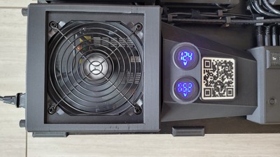 Closer look at the PSU. Notice the voltmeters on the 12v and 5v rails to be sure that we don't run low on power for the nodes (which would be almost impossible for a beefy power supply like this one!)