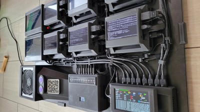 A higher view of the main cable raceway and running labs as hypervisors are booting.